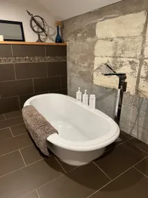 Beautiful Soaker Tub, King Bed, and Comfy Space - Image 2