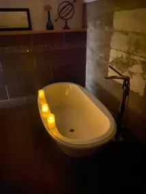 Beautiful Soaker Tub, King Bed, and Comfy Space - Image 3