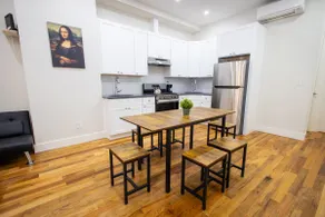 Modern 6 Bedroom 3 full bath steps from train - Image 3