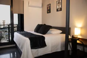 Modern apartment with a city view. - Image 2