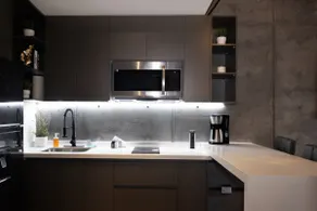 Modern apartment with a city view. - Image 4