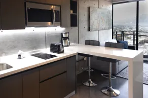 Modern apartment with a city view. - Image 3