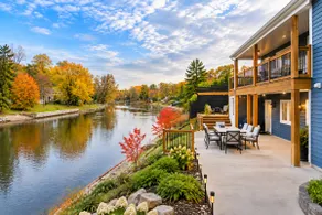 Luxury Riverfront Villa • Walk to Beach - Image 2