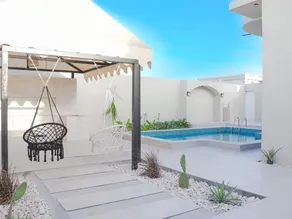 Oman's Unique Bali Chalet - Image 2