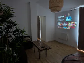 Cozy relaxation haven with spa and video projector - Image 5