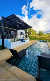 Modern villa with pool, grill, and fire pit - Image 4