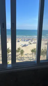 View of the sea. Foot in the sand. Praia Grande - Image 5