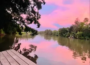 Riverside Oasis with FirePit, Canoe, Sunset Views - Image 4