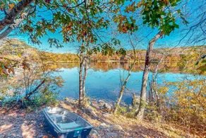 Spacious Lakefront Estate with Pool & Views - Image 3