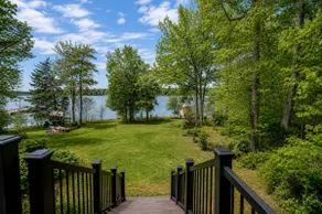 4BR lakefront villa w/ deck, fire pit, W/D, & dock - Image 4