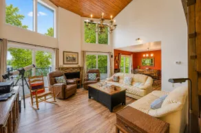 4BR lakefront villa w/ deck, fire pit, W/D, & dock - Image 2
