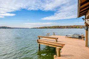 4BR lakefront villa w/ deck, fire pit, W/D, & dock - Image 5