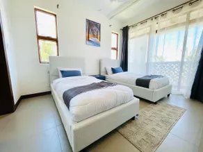 Beachfront Oasis | Balcony Sunsets | Fast WiFi | 3 Pools + Waterpark - Image 4