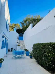 blue house near the sea - Image 2