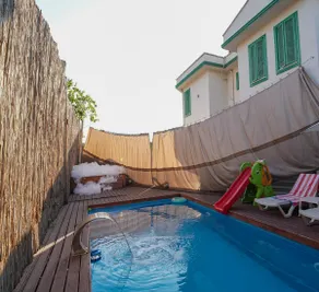 Villa with Green Shutters and Garden - Image 3