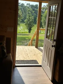 Lumber Jack Cabin Is cozy over look a nice lake. - Image 4