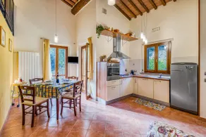 Tuscan Sun Duplex with Balcony and Shared Pool - Happy Rentals - Image 4