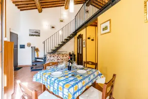 Tuscan Sun Duplex with Balcony and Shared Pool - Happy Rentals - Image 3