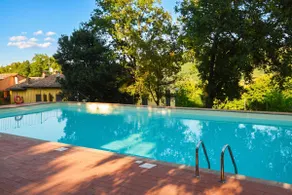 Tuscan Sun Duplex with Balcony and Shared Pool - Happy Rentals - Image 2