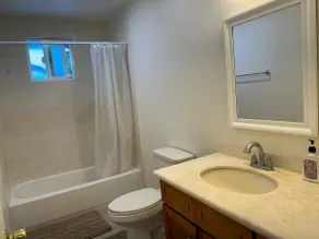Two-bedroom semi-detached house with private entrance, quiet oasis in a busy area, and two dedicated parking spaces in the front yard - Image 5