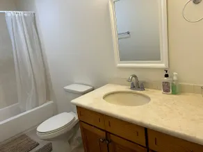 Two-bedroom semi-detached house with private entrance, quiet oasis in a busy area, and two dedicated parking spaces in the front yard - Image 4
