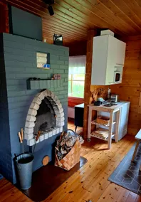 A cozy cottage with a fireplace and sauna in the heart of Lapland - Image 5