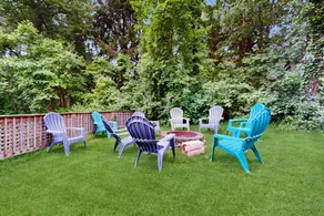 Bright Beachside Haven with Firepit & Deck - Image 2