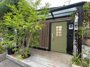 This is a unique space with a spacious living room with a large monitor and two bedrooms with bunk beds. - Image 5