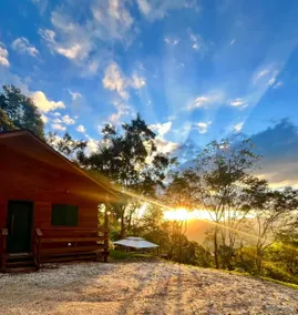 Farmhouse cabin with hot tub and sunset - Image 5