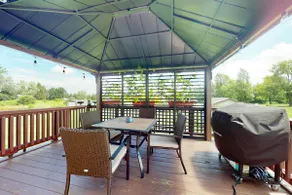 Relaxing 3BR home with a deck & firepit - Image 3