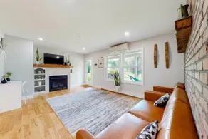 Relaxing 3BR home with a deck & firepit - Image 2