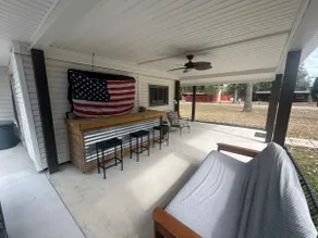 Quaint Cabin with outdoor TV, bar, and hot tub! - Image 4