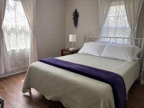 Park view • Porch swing • 2BA | Manchester Manor - Image 3