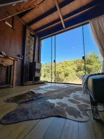 Cottage in front of a waterfall with Jacuzzi and fireplace - Image 3