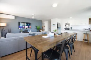 Modern Riverfront Apartment: Walk to Beach & Wharf - Image 5