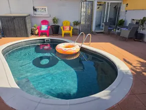 Bedroom + bathroom, pool, and private hot tub - Image 2