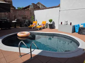 Bedroom + bathroom, pool, and private hot tub - Image 5