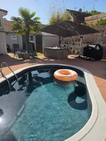 Bedroom + bathroom, pool, and private hot tub - Image 3
