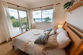 Sunset Paradise · Stylish Beachfront Condo - Image 2
