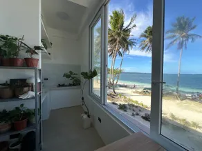 Cozy Sunrise Beachfront Flat - Image 5