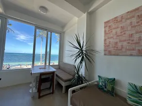 Cozy Sunrise Beachfront Flat - Image 2