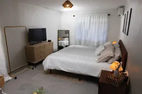 King Bed Ina's Beachfront Apartment - Image 3