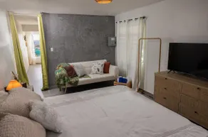 King Bed Ina's Beachfront Apartment - Image 2