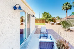 Charming 2BR with a work desk, grill, patio, & AC - Image 2