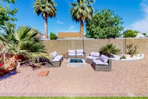 Charming 2BR with a work desk, grill, patio, & AC - Image 5