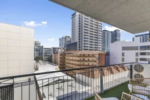 Modern Urban Escape: 2BR with South-Facing Balcony - Image 5