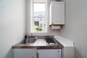 Modern apartment w/ yard - Image 3