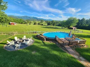 Finished Basement with a pool and a fire pit - Image 5