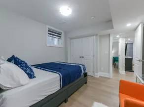 Modern 2BR Suite | Full Kitchen & Parking - Image 3