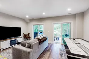 Charming lakefront retreat with game room and covered dock access - Image 4